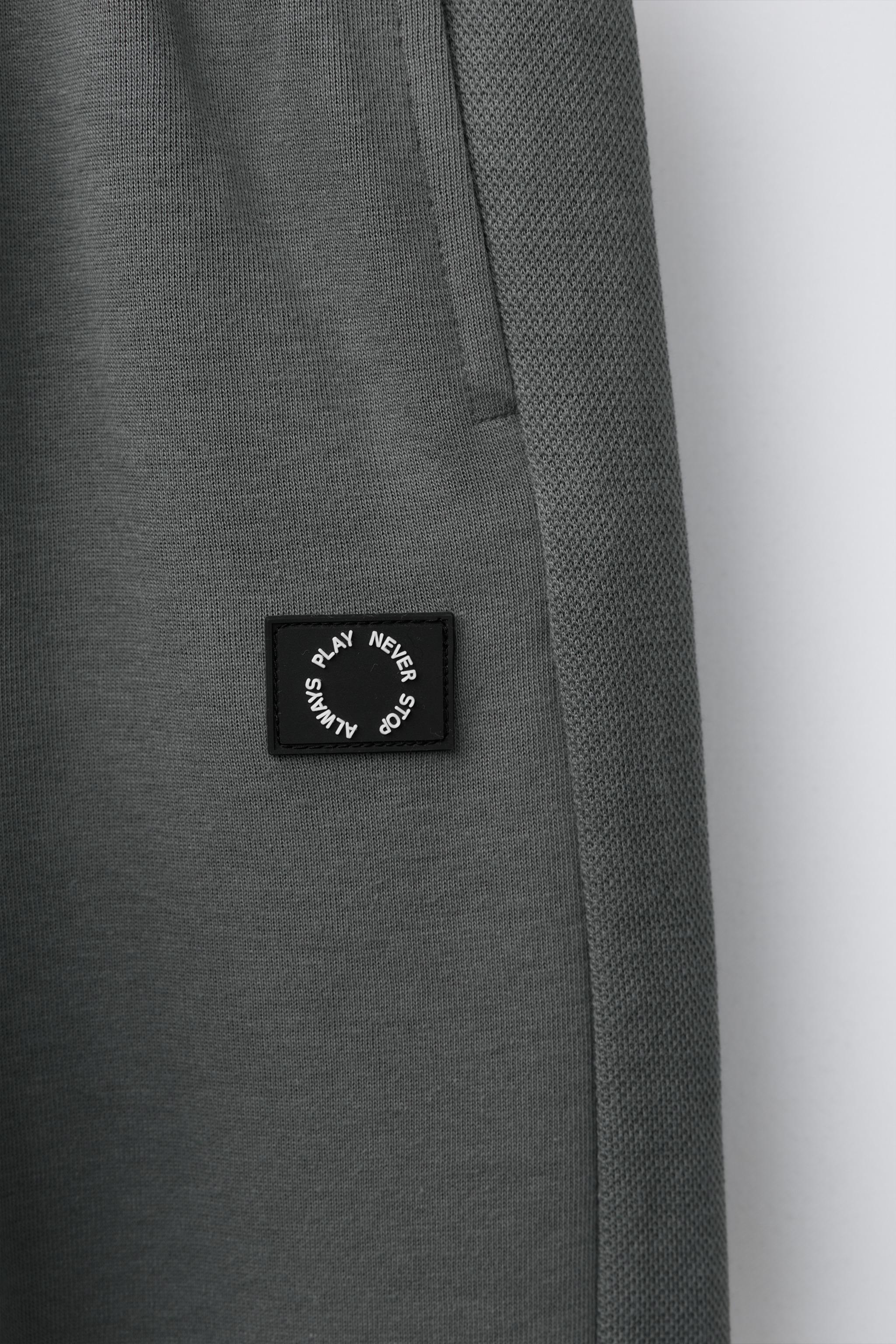 INTERLOCK PIQUÉ JOGGER PANTS